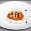 Butternut squash cakes topped with pecans honey apples and mascarpone cheese