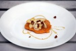 Butternut squash cakes topped with pecans honey apples and mascarpone cheese